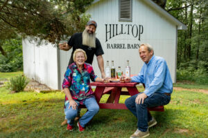 Owners at Hill Top at a picnic table